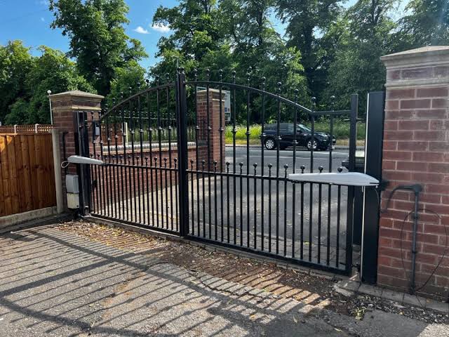 KJ Trading team delivering professional security installations